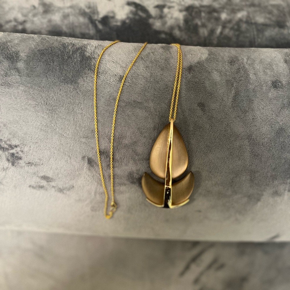 The undefinable Handmade Allure of Alexis Bittar Signature necklace.